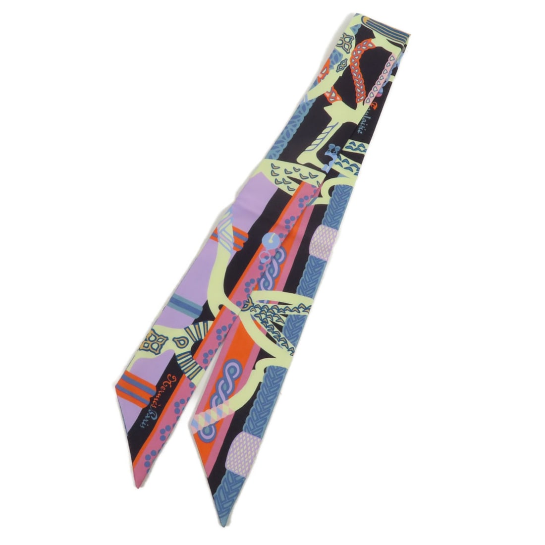 Silk Twilly Scarf by Hermes in Multicolor: Silk Twilly Scarf by Hermes in Multicolor This Hermes Twilly scarf features a vibrant multicolor design and is crafted from luxurious silk. Made in France, it offers both elegance and versatility, mak