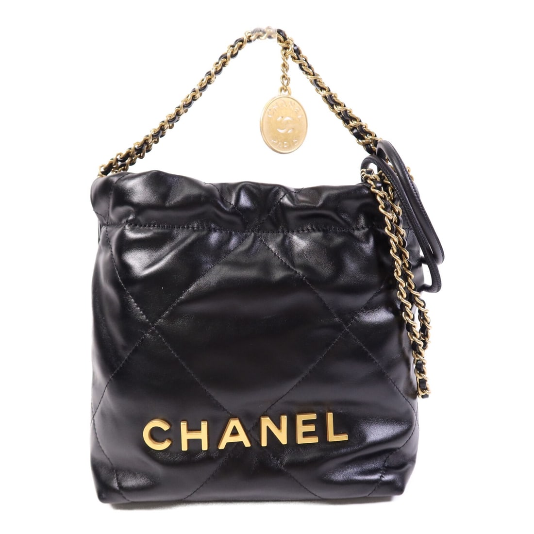Chanel Mini 22 Shoulder Bag Black Calfskin with Gold Hardware: Chanel Mini 22 Shoulder Bag Black Calfskin with Gold Hardware This Chanel Mini 22 shoulder bag features a sleek black calfskin leather exterior and a compact, regular-sized silhouette. The bag is desi