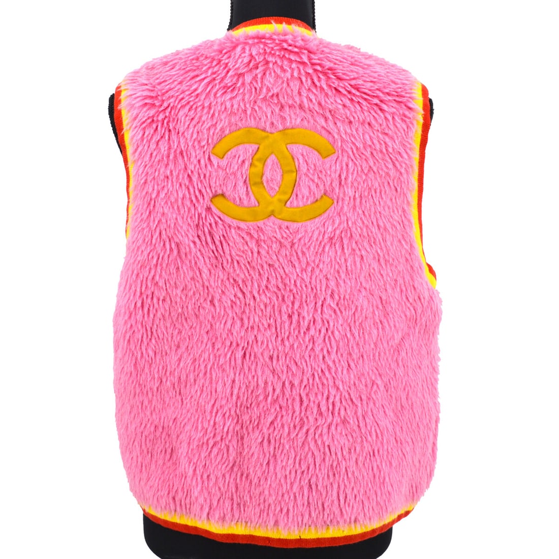 Chanel 94A Pink Cashmere Alpaca Sleeveless Vest Size 38: Chanel 94A Pink Cashmere Alpaca Sleeveless Vest Size 38 Elevate your wardrobe with this stunning Chanel sleeveless vest, crafted from a luxurious blend of 100% cashmere, 64% alpaca, and 36% cotton. Th