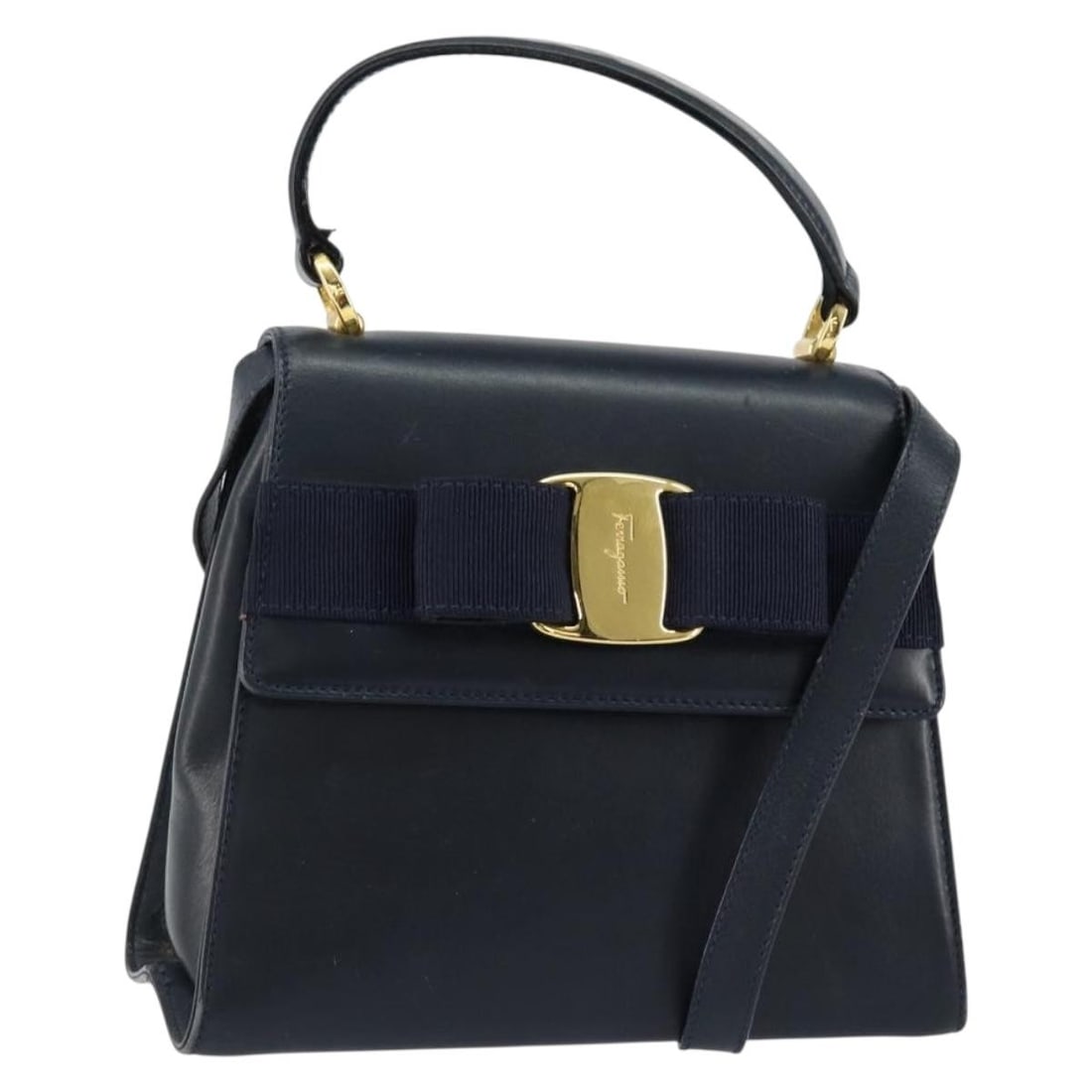 Vala Navy Leather Shoulder Bag by Salvatore Ferragamo: Vala Navy Leather Shoulder Bag by Salvatore Ferragamo This pre-owned Salvatore Ferragamo Vala handbag is crafted from navy leather and designed for women. It features both a handle and a shoulder stra