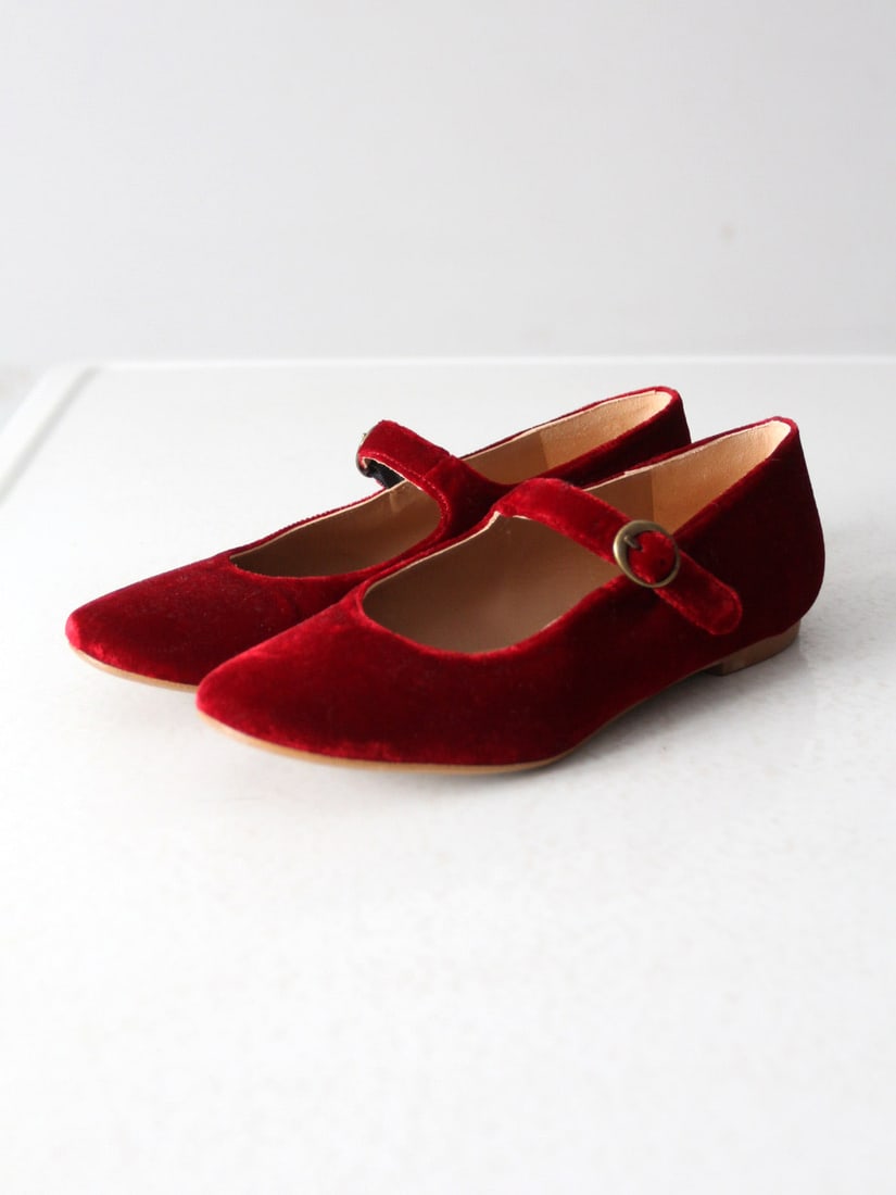 Sundance Vintage Red Velvet Mary Janes with Buckle Strap: Sundance Vintage Red Velvet Mary Janes with Buckle Strap Elevate your footwear collection with these stunning Vintage Red Velvet Mary Janes by Sundance. Crafted from soft, luxurious red velvet, these