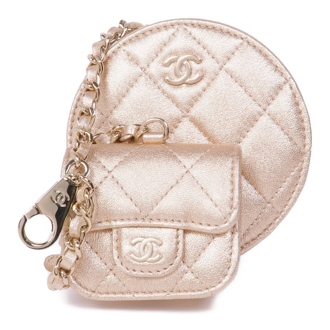 CHANEL Gold Lambskin Coin Case Purse with GHW: CHANEL Gold Lambskin Coin Case Purse with GHW Introducing a luxurious CHANEL coin purse, expertly crafted from premium lambskin leather, known for its softness and durability. This elegant purse featu