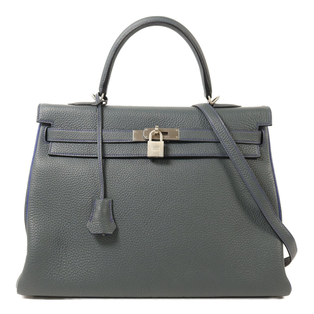 Hermes Kelly 32 Taurillon Clemence Leather Blue Two Way Shoulder Bag: Hermes Kelly 32 Taurillon Clemence Leather Blue Two Way Shoulder Bag This Hermes Kelly 32 is a versatile two-way shoulder bag crafted from Taurillon Clemence leather in a blue shade called Bleu Orage.