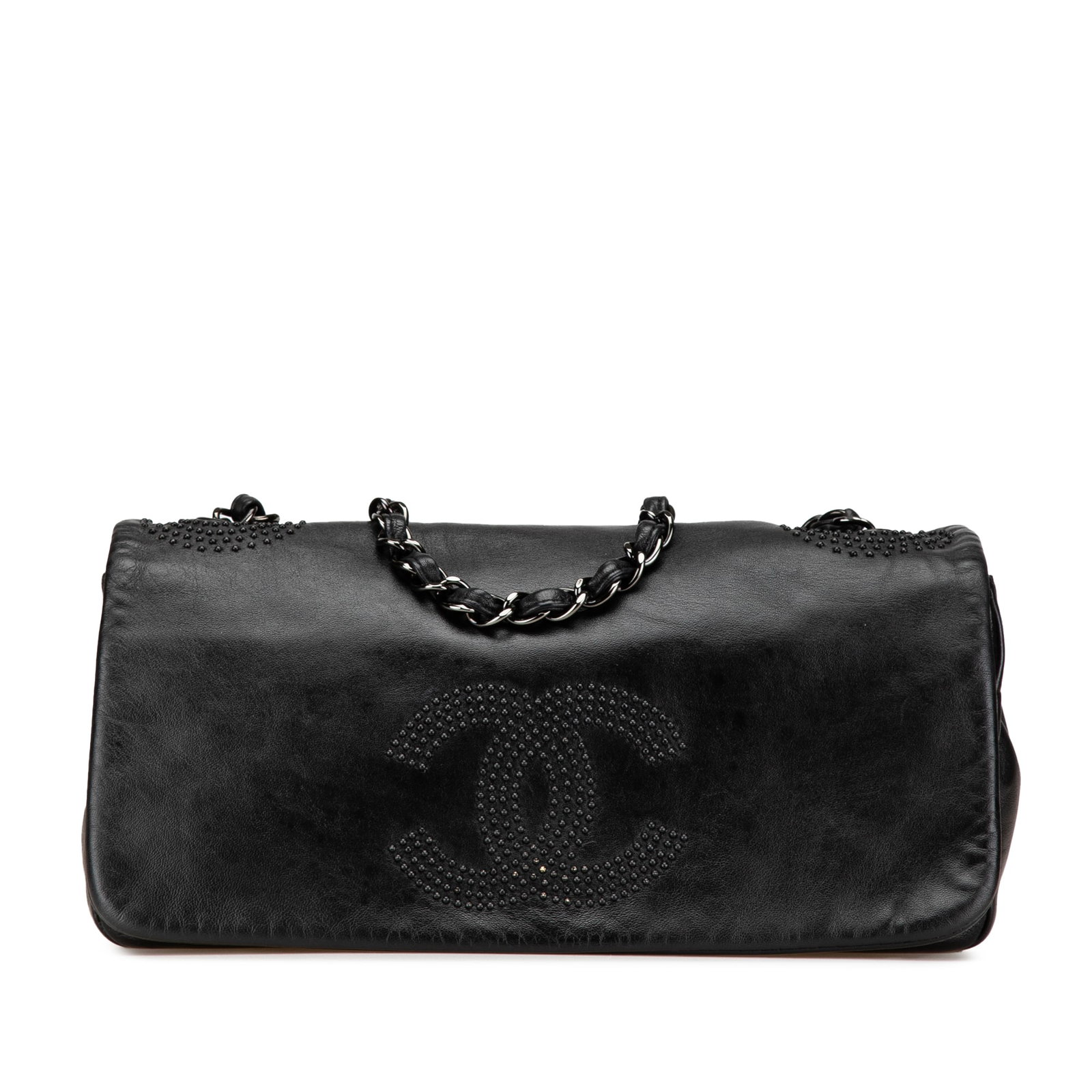 Chanel Lambskin CC Studded East West Flap Shoulder Bag Black: Chanel Lambskin CC Studded East West Flap Shoulder Bag Black This Chanel CC Studded Lambskin East West Flap shoulder bag features a black studded lambskin leather exterior, a leather-woven chain strap