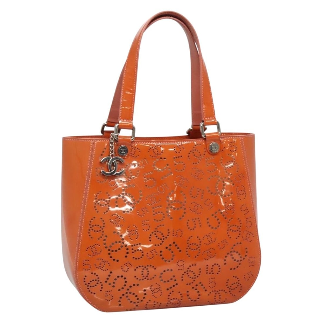 CHANEL Orange Silver Enamel Punching Tote Bag Auth 138790 Italy: CHANEL Orange Silver Enamel Punching Tote Bag Auth 138790 Italy This CHANEL Punching Tote Bag features a striking enamel finish in vibrant orange and silver. Crafted in Italy, this tote is designed fo