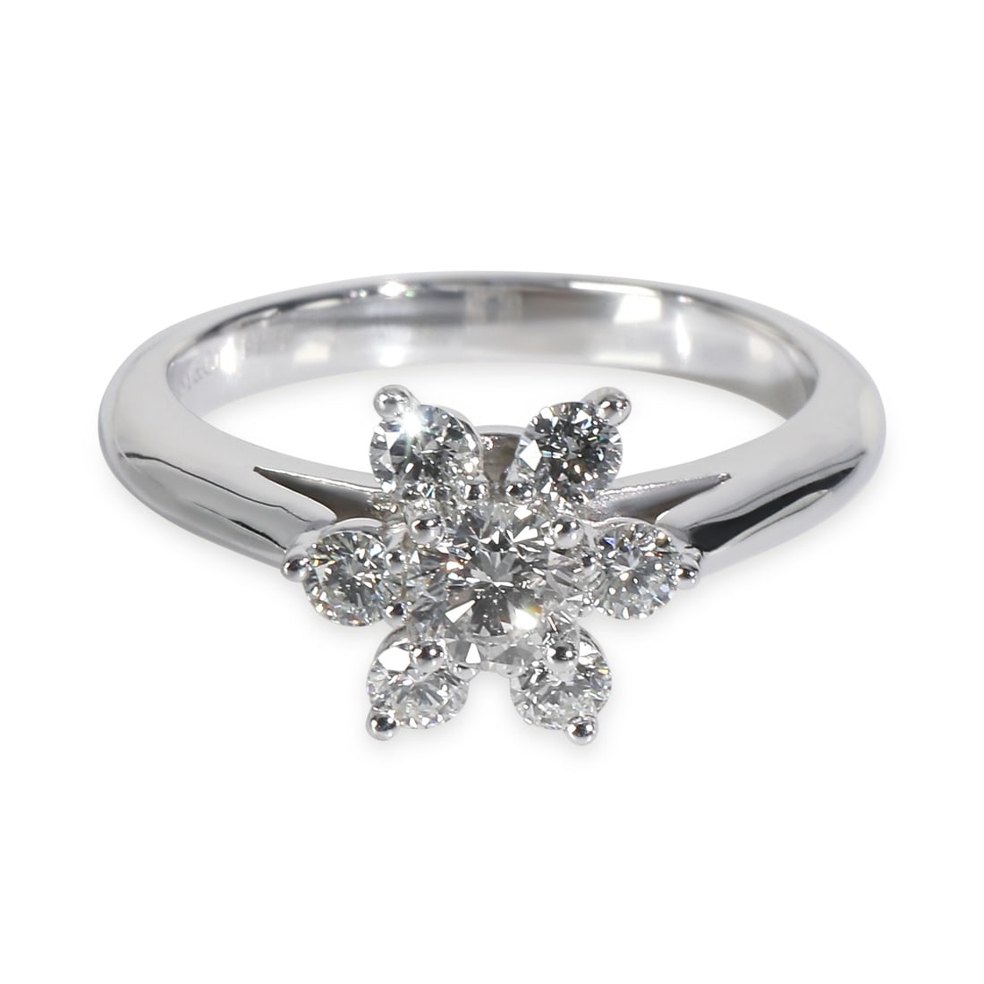 Tiffany & Co. Platinum 0.48ct Diamond Flower Ring: Tiffany & Co. Platinum 0.48ct Diamond Flower Ring This exquisite Tiffany & Co. Flower Ring showcases a stunning round brilliant diamond, weighing 0.48 carats, set in luxurious 950 platinum. The ring i