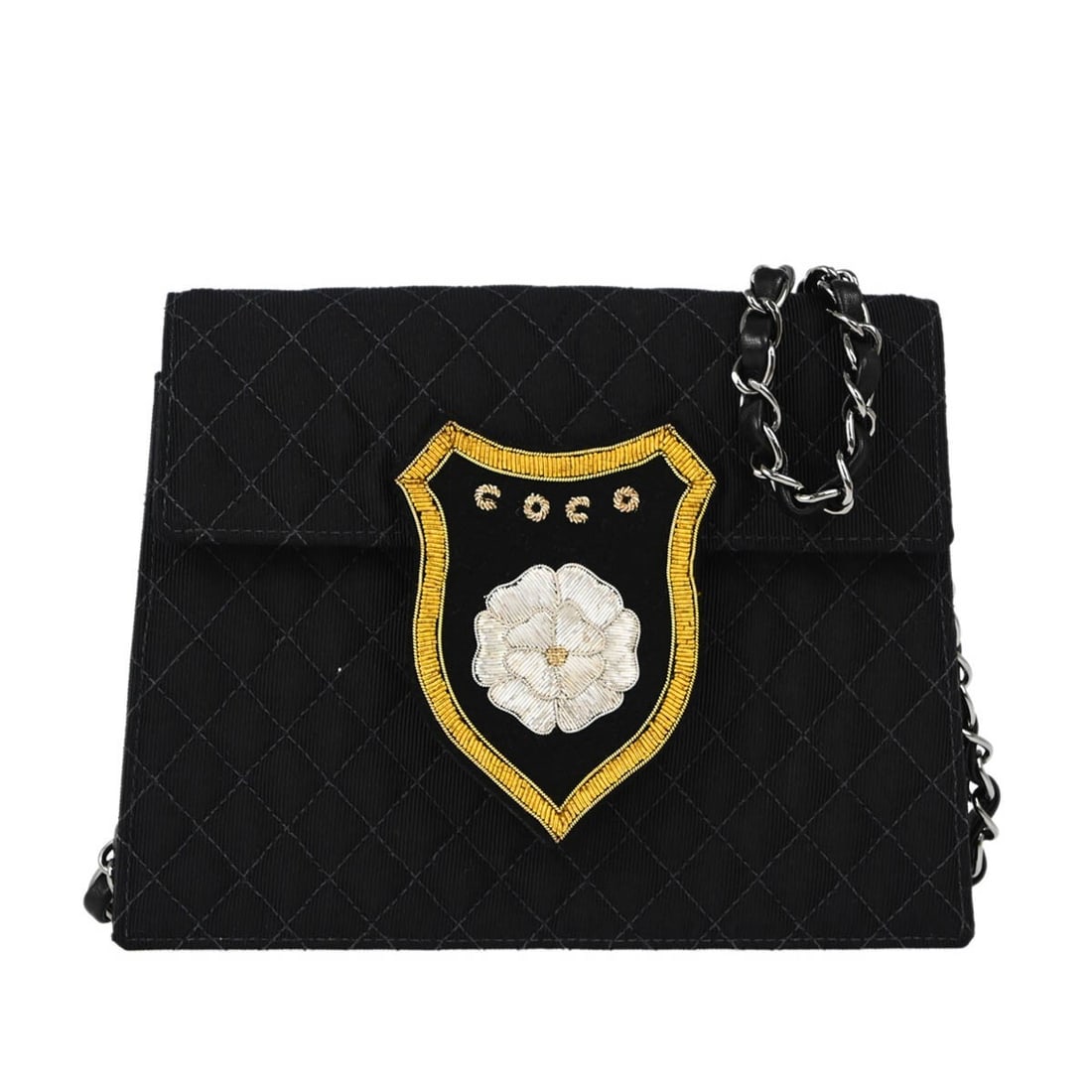 Chanel Black Nylon Quilted Chain Shoulder Bag Classic Flap: Chanel Black Nylon Quilted Chain Shoulder Bag Classic Flap Elevate your casual style with the Chanel Black Emblem Chain Shoulder Bag, featuring a classic quilted pattern and iconic emblem accents. Thi
