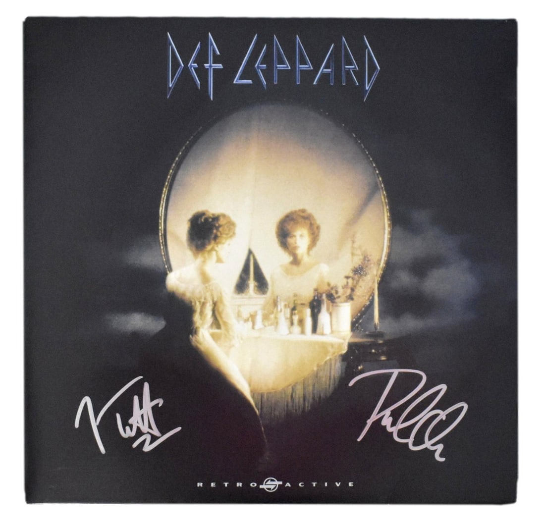 Def Leppard Retroactive Dual-Signed Album Joe Elliott Phil Collen JSA Authenticated: Def Leppard Retroactive Dual-Signed Album Joe Elliott Phil Collen JSA Authenticated This is an original Def Leppard album titled "Retroactive," featuring dual signatures from band members Joe Elliott