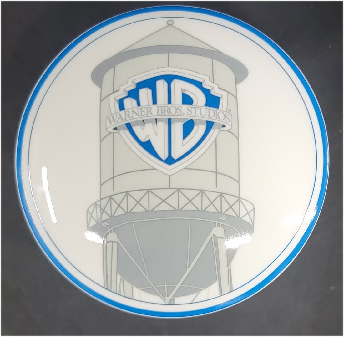 Warner Brothers Studios Water Tower Plate by Tiffany & Co Original: Warner Brothers Studios Water Tower Plate by Tiffany & Co Original This exquisite plate from Warner Brothers Studios was crafted by the renowned Tiffany & Co. It features the iconic water tower design