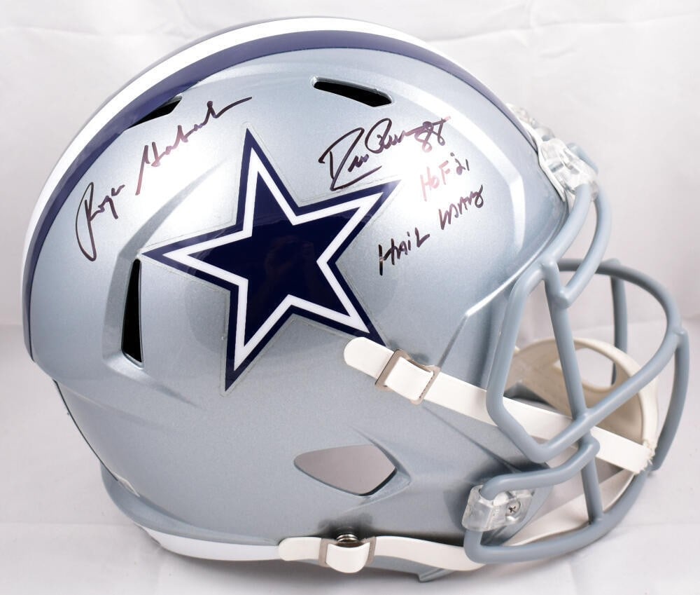 Dallas Cowboys Helmet Signed by Drew Pearson and Roger Staubach Beckett Authenticated: Dallas Cowboys Helmet Signed by Drew Pearson and Roger Staubach Beckett Authenticated This Dallas Cowboys full-size Speed helmet is autographed by both Drew Pearson and Roger Staubach. The helmet is a