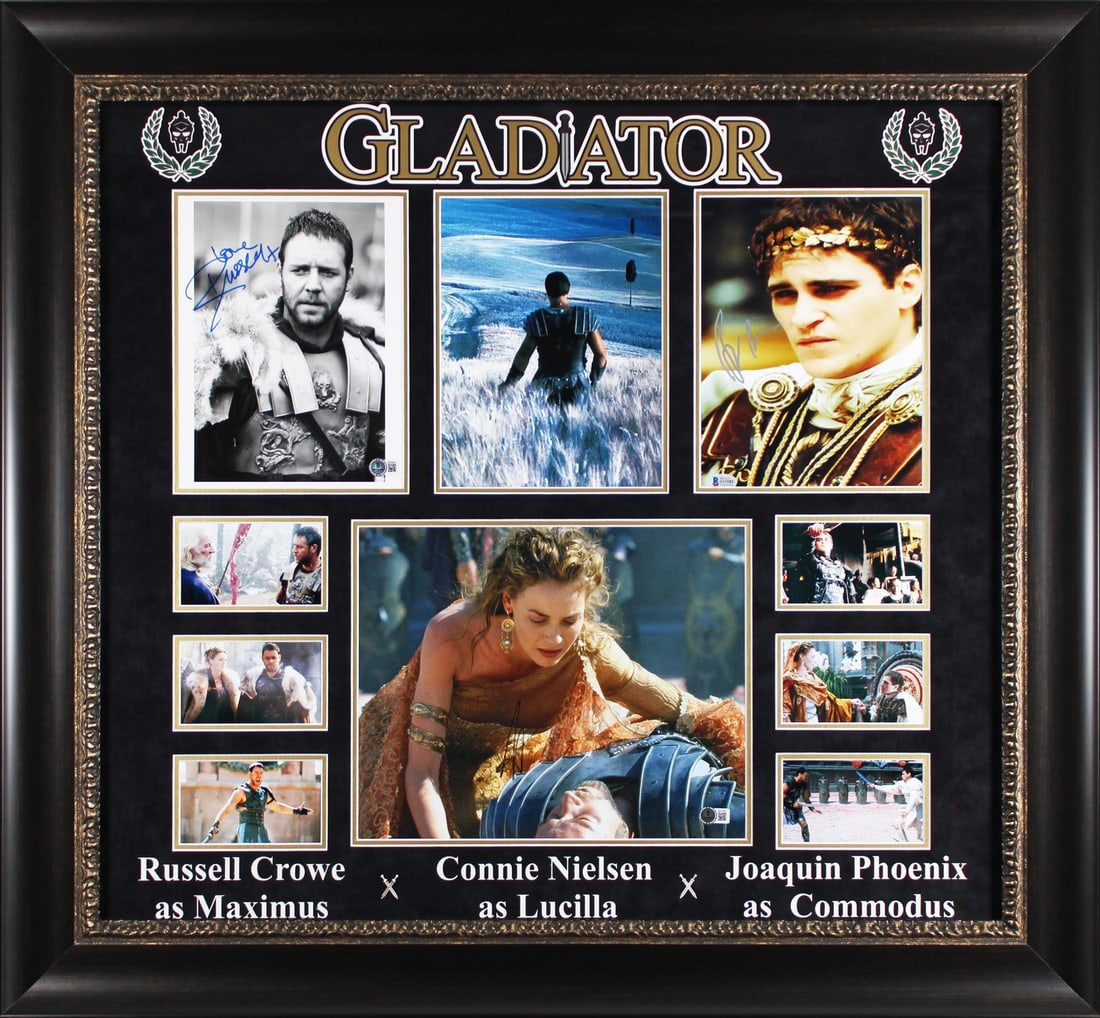 Gladiator Signed Framed Display by Crowe Phoenix Nielsen BAS Authenticated: Gladiator Signed Framed Display by Crowe Phoenix Nielsen BAS Authenticated This stunning framed display features authentic signatures from Russell Crowe, Joaquin Phoenix, and Connie Nielsen, all celeb