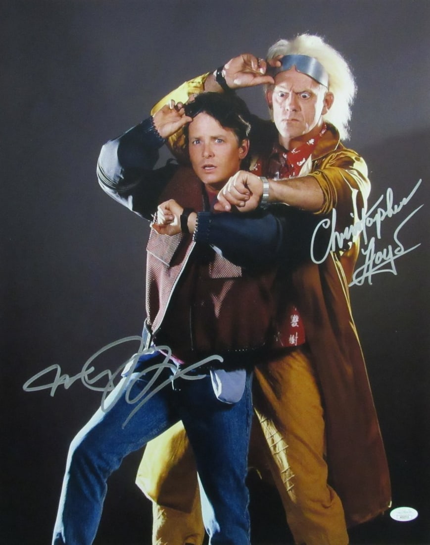 Michael J Fox Christopher Lloyd Autographed 16x20 Photo Back to the Future JSA Certified: Michael J Fox Christopher Lloyd Autographed 16x20 Photo Back to the Future JSA Certified This is an authentic autographed 16x20 photo featuring Michael J. Fox and Christopher Lloyd from the classic fi