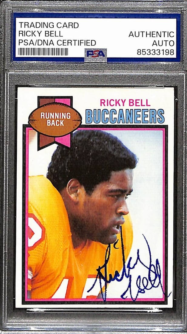 Ricky Bell HOF Signed 1979 Topps Rookie Card #258 PSA/DNA Authenticated: Ricky Bell HOF Signed 1979 Topps Rookie Card #258 PSA/DNA Authenticated This offering features a Ricky Bell Hall of Fame Signed 1979 Topps Card #258, showcasing the Buccaneers rookie. The card is auth