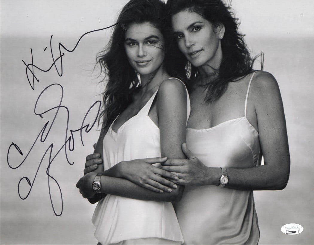 Cindy Crawford Kaia Gerber Signed 11X14 Photo JSA Authenticated: Cindy Crawford Kaia Gerber Signed 11X14 Photo JSA Authenticated This stunning 11x14 photograph features the iconic signatures of supermodel Cindy Crawford and her daughter Kaia Jordan Gerber. This uni