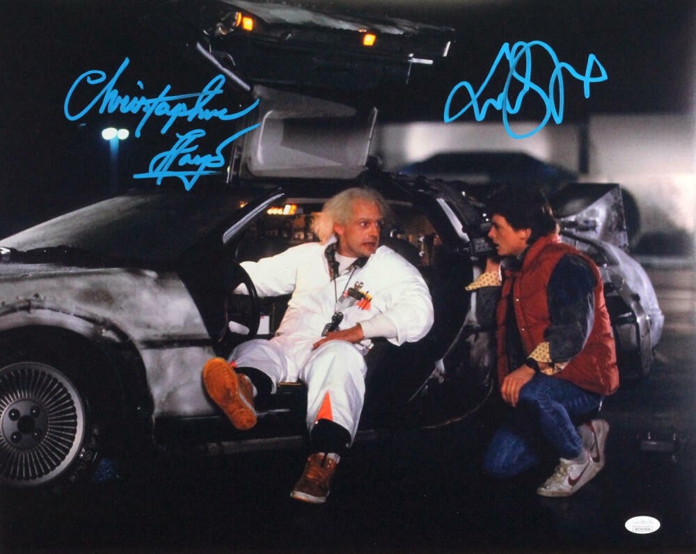Christopher Lloyd MJ Fox Signed Back to the Future 16x20 Photo JSA Authenticated: Christopher Lloyd MJ Fox Signed Back to the Future 16x20 Photo JSA Authenticated This stunning 16x20 photograph captures the iconic duo, Christopher Lloyd and Michael J. Fox, in a memorable moment fro