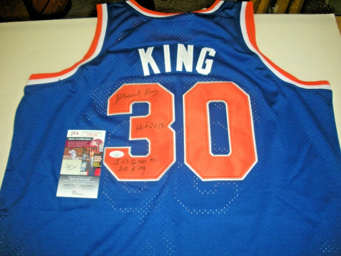 Bernard King Autographed New York Mitchell & Ness Jersey with JSA COA: Bernard King Autographed New York Mitchell & Ness Jersey with JSA COA This official licensed Mitchell & Ness New York jersey is signed by basketball legend Bernard King. The jersey comes with a JSA/CO