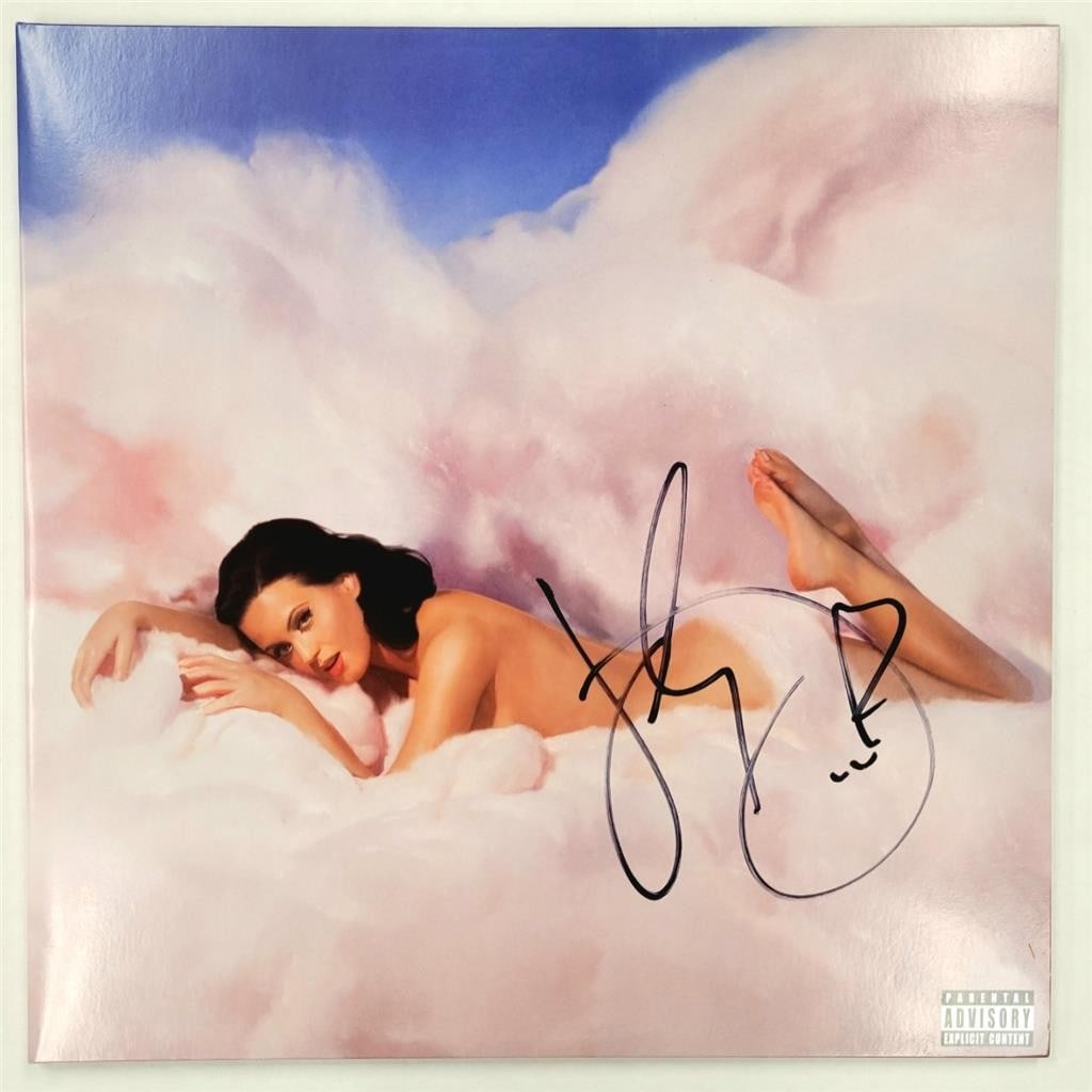 Katy Perry Autographed Teenage Dream Album Cover Beckett Authenticated: Katy Perry Autographed Teenage Dream Album Cover Beckett Authenticated This is a pre-owned original 'Teenage Dream' vinyl album cover signed by Katy Perry. The autograph has been authenticated by Beck