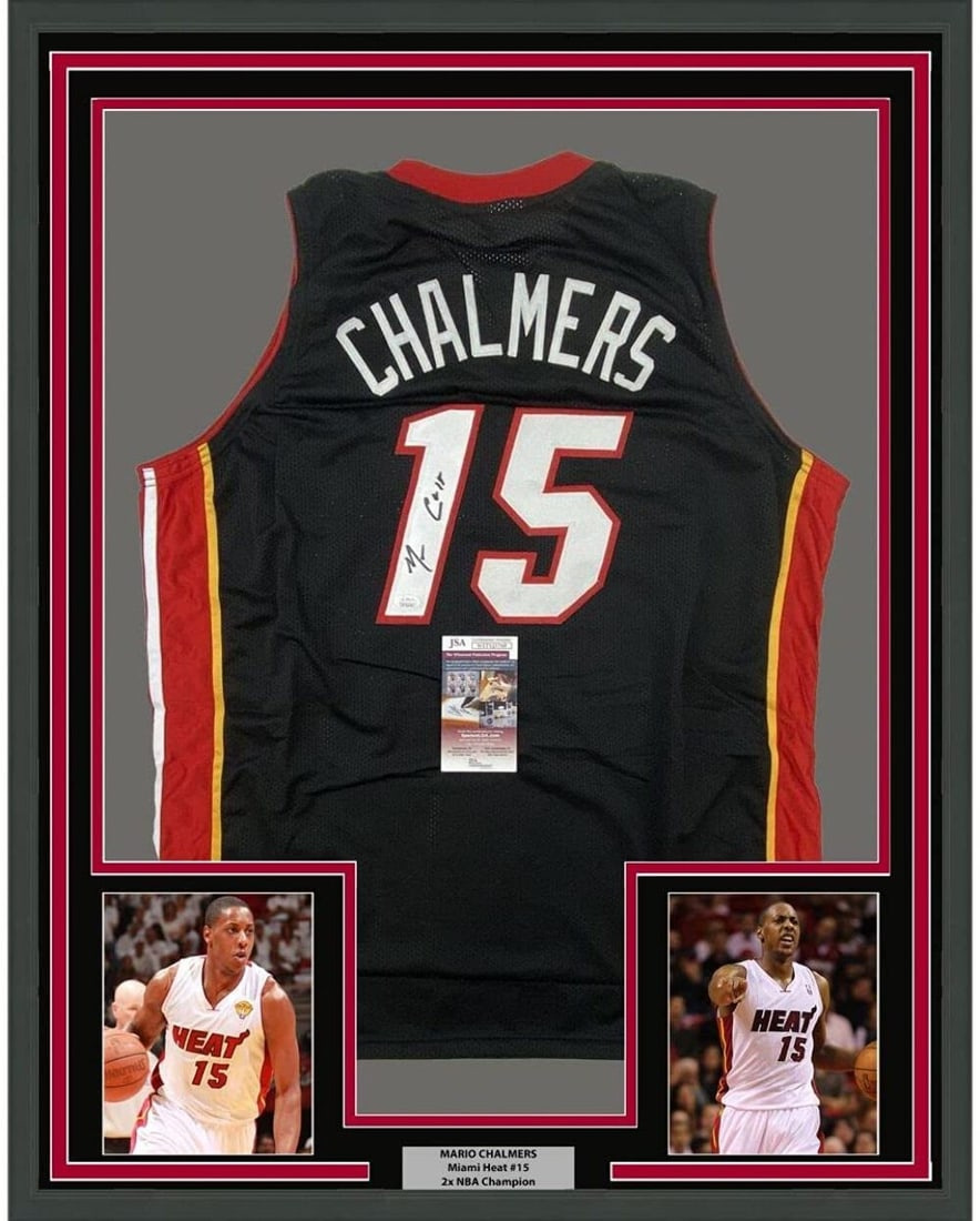 Framed Autographed Mario Chalmers NBA Jersey with JSA COA: Framed Autographed Mario Chalmers NBA Jersey with JSA COA Celebrate your love for basketball with this professionally framed and autographed black jersey of NBA player Mario Chalmers. The jersey measu