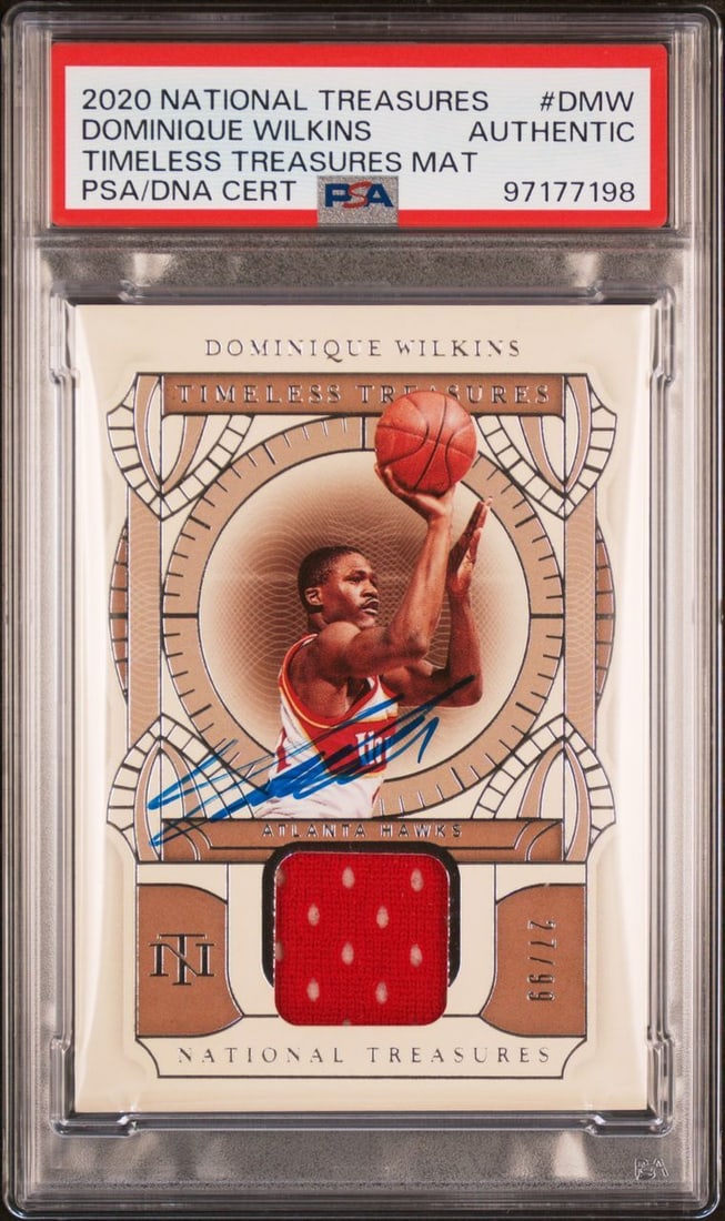 2020 Panini National Treasures Dominique Wilkins Autographed Card 27/99 PSA Authenticated: 2020 Panini National Treasures Dominique Wilkins Autographed Card 27/99 PSA Authenticated This is a 2020 Panini National Treasures Timeless Treasures Material sports trading card featuring the legenda
