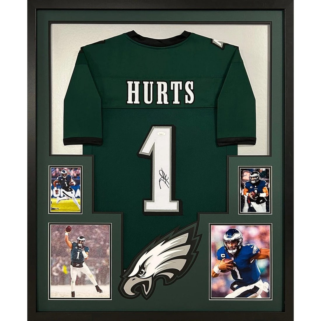 Jalen Hurts Autographed Framed Green Eagles Jersey with JSA Authentication: Jalen Hurts Autographed Framed Green Eagles Jersey with JSA Authentication This is an autographed Jalen Hurts framed jersey, showcasing the quarterback's signature and authenticated by JSA, a leading