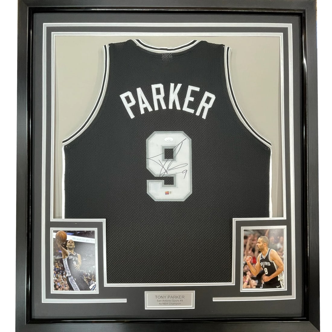 Framed Tony Parker Signed Jersey 33x42 San Antonio Spurs JSA COA: Framed Tony Parker Signed Jersey 33x42 San Antonio Spurs JSA COA This professionally framed and matted jersey features the iconic black design of Tony Parker, a celebrated player of the San Antonio Sp