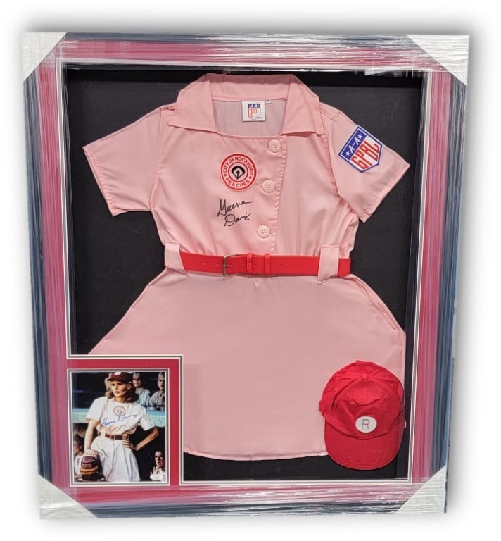 Framed Geena Davis Signed Jersey Dress and Photo JSA Authenticated A League of Their Own: Framed Geena Davis Signed Jersey Dress and Photo JSA Authenticated A League of Their Own This is a custom-framed jersey dress from "A League of Their Own" Peaches, personally signed by Geena Davis. Th