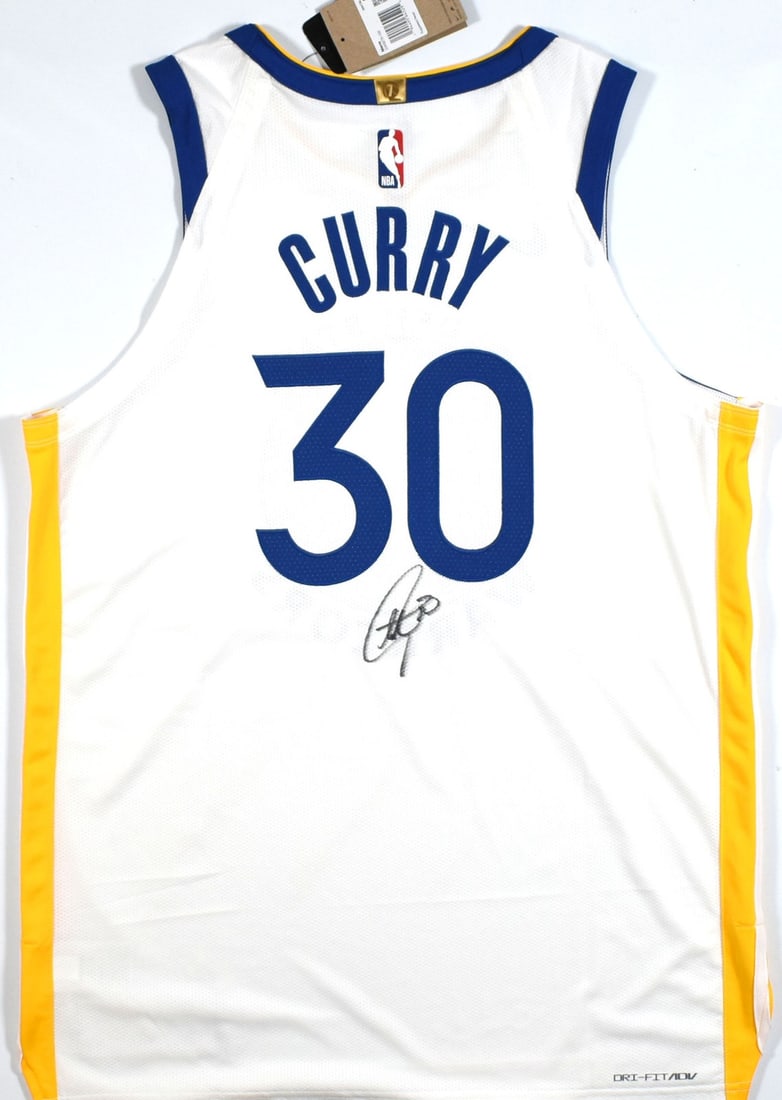 Steph Curry Signed Golden State Warriors Nike Jersey JSA Certified: Steph Curry Signed Golden State Warriors Nike Jersey JSA Certified This original Golden State Warriors Nike Association jersey features the autograph of NBA superstar Steph Curry. The jersey is a pre-