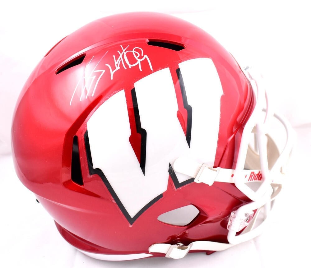 JJ Watt Autographed Wisconsin Badgers Flash Speed Helmet Beckett Authenticated: JJ Watt Autographed Wisconsin Badgers Flash Speed Helmet Beckett Authenticated This is an original full-size flash speed helmet signed by JJ Watt, showcasing his autograph for fans and collectors alik