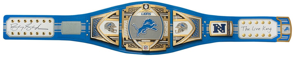 Barry Sanders Signed WWE Lions Wrestling Belt with Lion King Inscription COA: Barry Sanders Signed WWE Lions Wrestling Belt with Lion King Inscription COA This is a full-size authentic blue wrestling belt, measuring 53 inches long and 12 inches wide in the center, featuring the