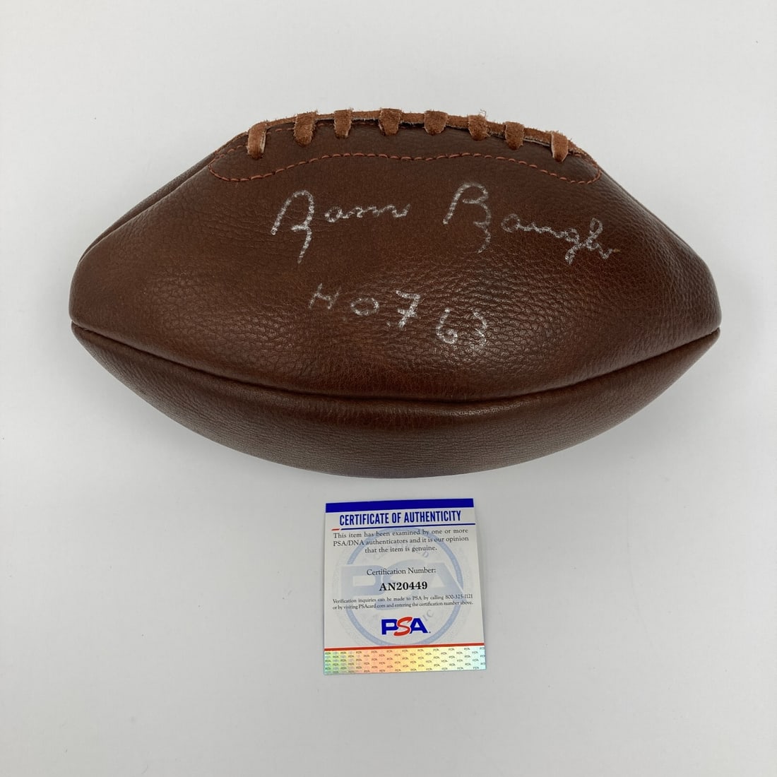 Sammy Baugh Signed 1963 NFL Football with PSA DNA COA: Sammy Baugh Signed 1963 NFL Football with PSA DNA COA Celebrate the legacy of football legend Sammy Baugh with this Hall of Fame 1963 signed vintage NFL football. This authentic piece is accompanied b