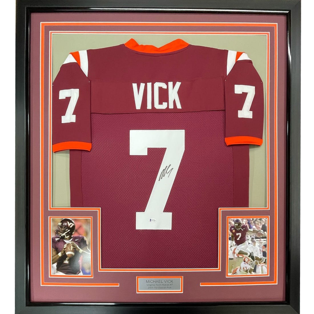 Framed Autographed Michael Vick Virginia Tech Jersey PSA COA 33x42: Framed Autographed Michael Vick Virginia Tech Jersey PSA COA 33x42 This impressive piece features a professionally framed and matted autographed jersey of Michael Vick, a standout athlete from Virgini
