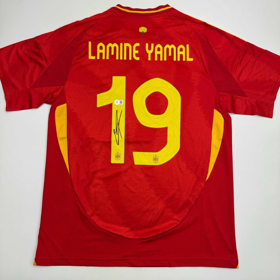 Lamine Yamal Autographed Spain Red World Cup Jersey BAS COA: Lamine Yamal Autographed Spain Red World Cup Jersey BAS COA Celebrate the spirit of soccer with this autographed Lamine Yamal Spain Red World Cup Soccer Jersey. Featuring the name and number of the ta