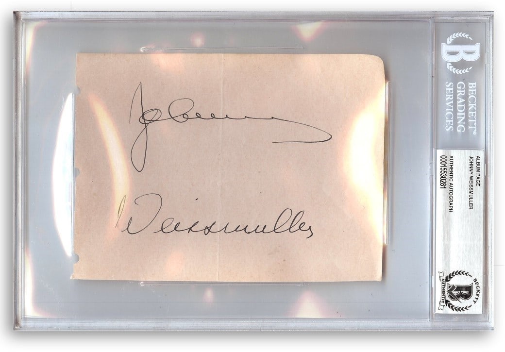 Johnny Weissmuller Signed Album Page with Beckett Authentication: Johnny Weissmuller Signed Album Page with Beckett Authentication This is an original album page autographed by Johnny Weissmuller, renowned Olympic athlete and Tarzan actor. The signed item comes enca