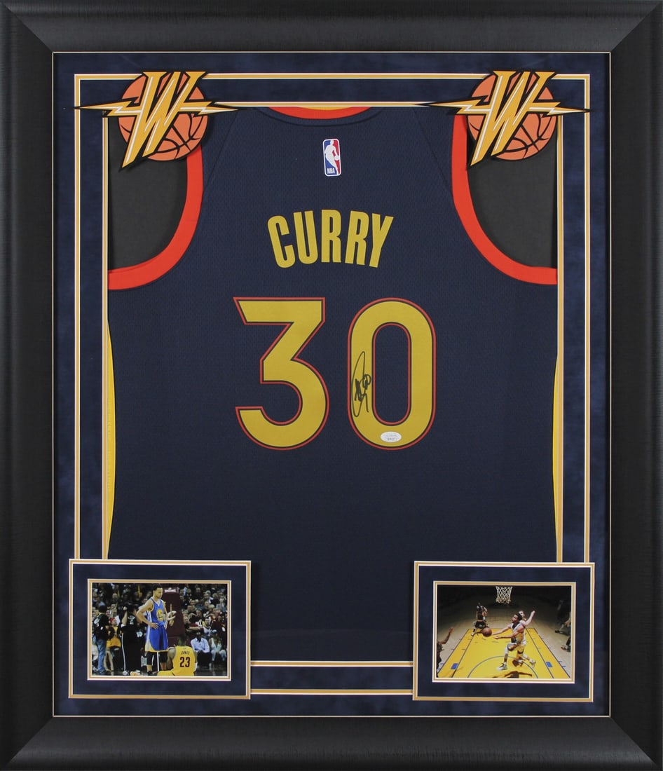 Stephen Curry Signed Navy Nike Warriors Jersey Framed With JSA COA: Stephen Curry Signed Navy Nike Warriors Jersey Framed With JSA COA This professionally framed navy blue Nike Swingman jersey features an authentic hand-signed autograph by Stephen Curry of the Golden