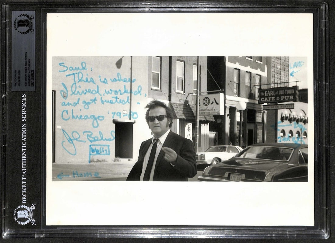 John Belushi Signed Blues Brothers 8x10 Photo with Personal Inscription BECKETT Authenticated: John Belushi Signed Blues Brothers 8x10 Photo with Personal Inscription BECKETT Authenticated This extraordinary 8x10 black-and-white photo captures John Belushi during a break while filming 'The Blue