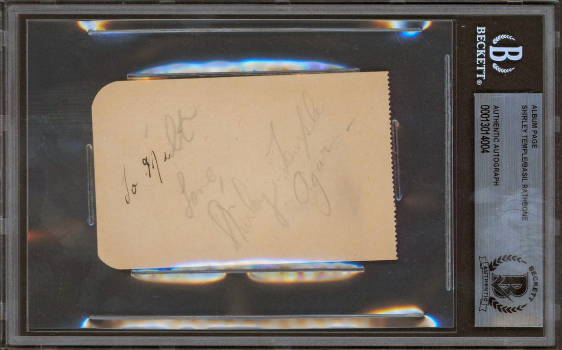 Beckett Authenticated Album Page Signed by Shirley Temple and Basil Rathbone (1 of 5)
