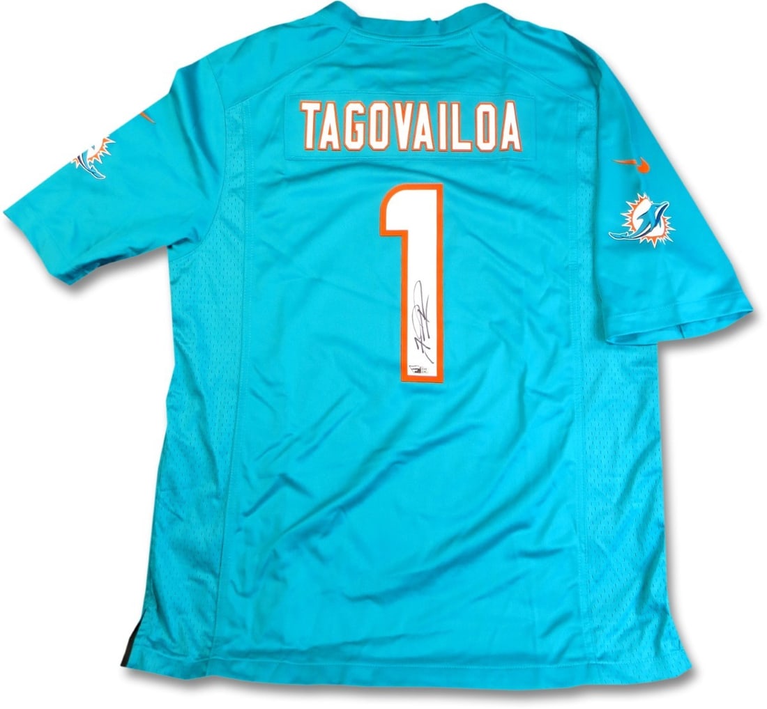 Tua Tagovailoa Miami Dolphins Signed Authentic Teal Jersey: Tua Tagovailoa Miami Dolphins Signed Authentic Teal Jersey This authentic Miami Dolphins jersey is signed by Tua Tagovailoa, showcasing your support for the star quarterback. The teal jersey is a must