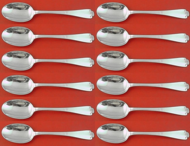 Tiffany & Co Flemish Sterling Silver Teaspoon Set of 12: Tiffany & Co Flemish Sterling Silver Teaspoon Set of 12 Elevate your dining experience with this exquisite set of 12 Flemish teaspoons by Tiffany & Co. Each spoon, measuring 5 7/8" long, showcases the
