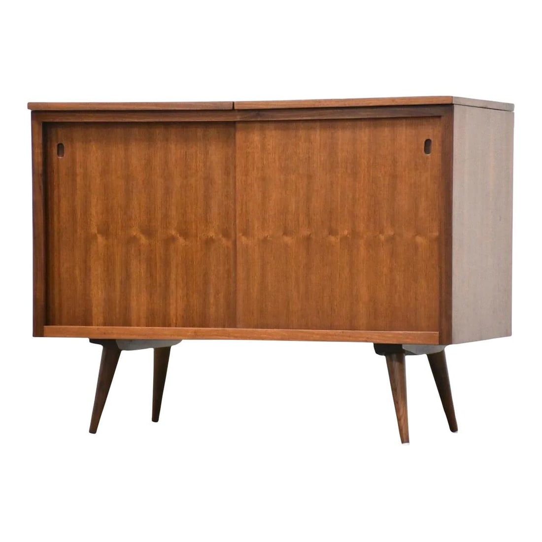 Mid Century Modern Walnut Bar Credenza with Lift-Up Tops: Mid Century Modern Walnut Bar Credenza with Lift-Up Tops This mid-century modern credenza is crafted from walnut and features a beautifully refinished exterior. It includes convenient lift-up tops and