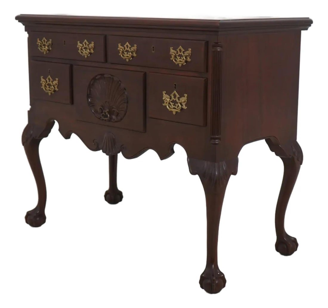 Mahogany Old Dominion Collection Chippendale Lowboy with Brass Hardware: Mahogany Old Dominion Collection Chippendale Lowboy with Brass Hardware This Chippendale style lowboy from the Biggs Old Dominion Collection features fine carved mahogany construction with intricate d