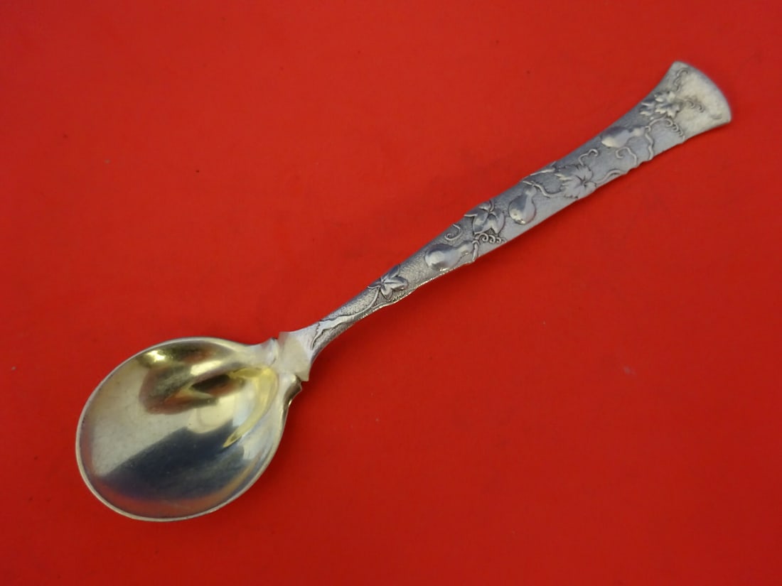 Tiffany & Co. Vine Sterling Silver Sherbet Spoon 5 5/8" Gold-Washed Gourds Motif: Tiffany & Co. Vine Sterling Silver Sherbet Spoon 5 5/8" Gold-Washed Gourds Motif This exquisite sherbet spoon is part of the 'Vine' pattern by Tiffany & Co., crafted from high-quality sterling silver.