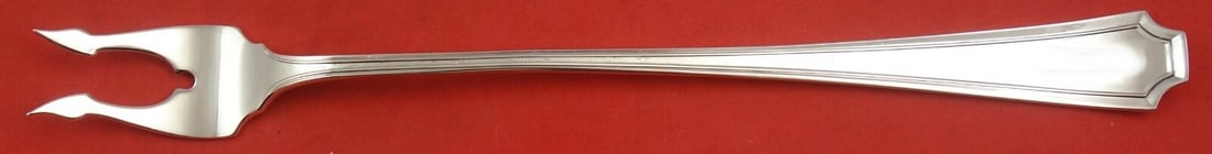 Durgin Fairfax Sterling Silver Pickle Fork 2-Tine Long Handle 7.5": Durgin Fairfax Sterling Silver Pickle Fork 2-Tine Long Handle 7.5" This exquisite pickle fork features a 2-tine design with a long handle, measuring 7 1/2" in length. Crafted from high-quality sterlin