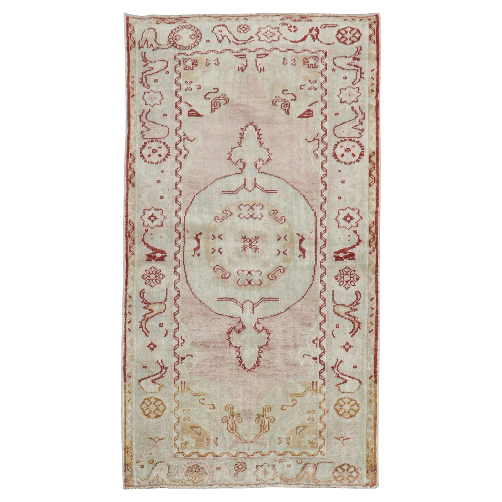 Vintage Turkish Oushak Pink Red Hand-Knotted Rug 3'1" x 5'8": Vintage Turkish Oushak Pink Red Hand-Knotted Rug 3'1" x 5'8" This vintage Turkish Anatolian rug from the Zabihi Collection features a soft pink field beautifully outlined in deep red, embodying a char