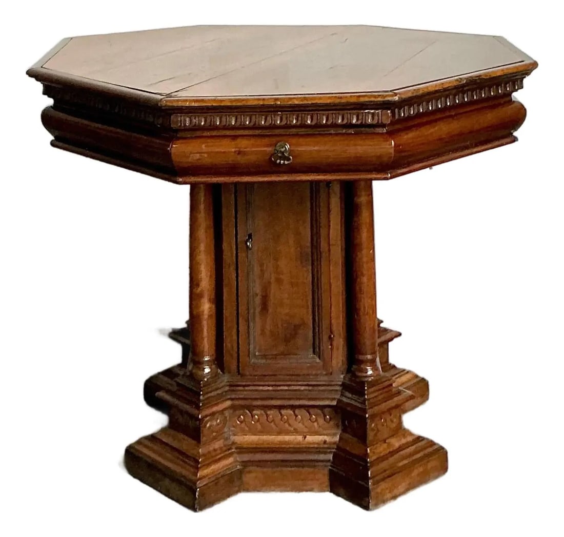 19th Century Ornately Carved Octagonal Pedestal Table with Gothic Revival Detailing: 19th Century Ornately Carved Octagonal Pedestal Table with Gothic Revival Detailing This vintage octagonal pedestal table showcases intricate late 19th-century carved detailing in the Gothic and Renai