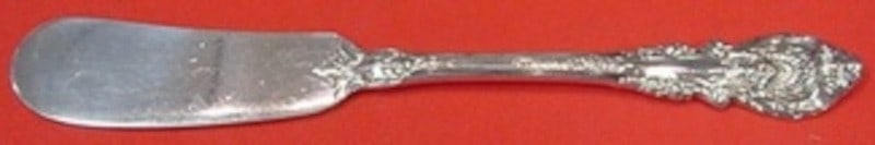 Sterling Silver Flat Handle Butter Spreader in Sir Christopher Pattern 6 3/8": Sterling Silver Flat Handle Butter Spreader in Sir Christopher Pattern 6 3/8" This butter spreader features a flat handle crafted from sterling silver with a stainless steel blade. It is designed in t