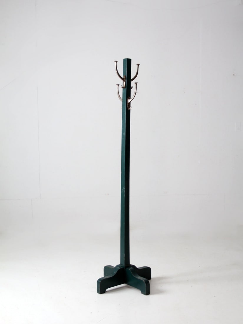 Vintage Teal Green Wooden Coat Rack with Silver Tone Hooks: Vintage Teal Green Wooden Coat Rack with Silver Tone Hooks Enhance your entryway with this vintage wooden coat rack, featuring a stunning rich teal green finish. Designed with four silver tone double