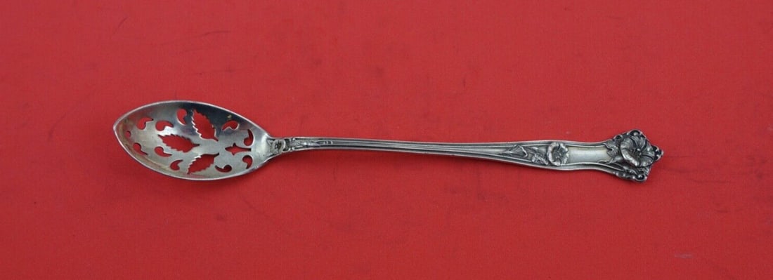 Alvin Morning Glory Sterling Silver Olive Spoon 6 1/8": Alvin Morning Glory Sterling Silver Olive Spoon 6 1/8" This exquisite serving spoon is a part of the Morning Glory pattern by Alvin, crafted from high-quality sterling silver. Measuring 6 1/8" in leng