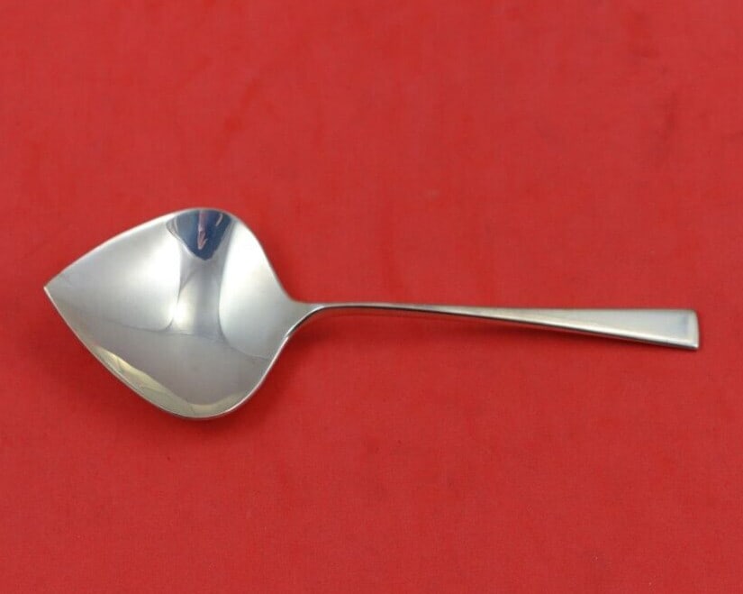 Reed & Barton Dimension Sterling Silver Nut Spoon Non-Pierced 4 7/8": Reed & Barton Dimension Sterling Silver Nut Spoon Non-Pierced 4 7/8" This elegant nut spoon from Reed & Barton is crafted from high-quality sterling silver and features the classic Dimension pattern.