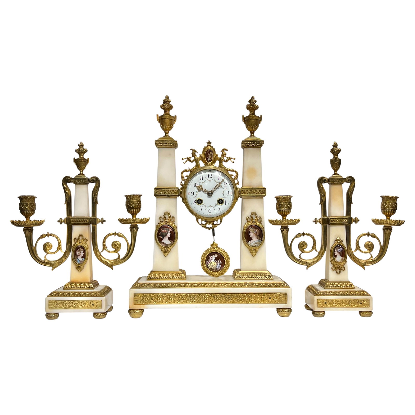 Set of 3 Louis XVI French Onyx and Bronze Clock with Candelabra c1880s: Set of 3 Louis XVI French Onyx and Bronze Clock with Candelabra c1880s This late 19th century French garniture set features a Louis XVI style mantel clock and a pair of two-light candelabra, meticulou