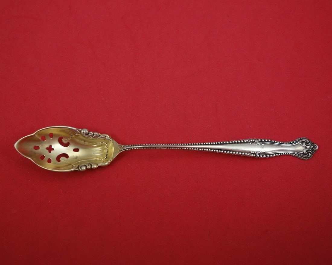 Towle Canterbury Sterling Silver Olive Spoon Gold Washed 6.5 Inch: Towle Canterbury Sterling Silver Olive Spoon Gold Washed 6.5 Inch This exquisite Canterbury olive spoon by Towle is a stunning addition to any collection. Crafted from high-quality sterling silver, th